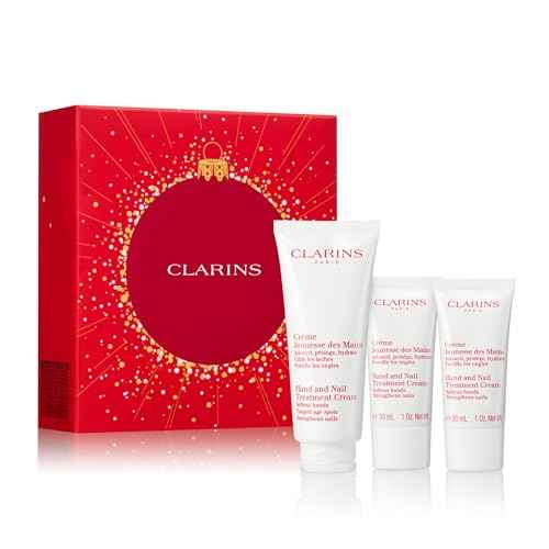 Clarins Hand and Nail Treatment Cream | Award-Winning | Softens, Nourishes and Shields Skin | Strengthens Nails and Conditions Cuticles | Natural Plant Extracts, Including Shea Butter