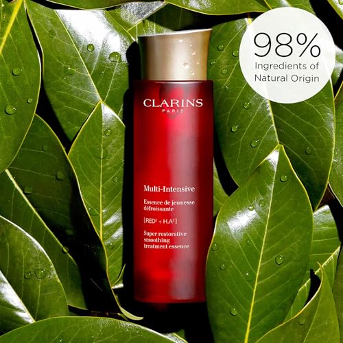 CLARINS Super Restorative Treatment Essence | Anti-Aging Face Lotion For Mature Skin Weakened By Hormonal Changes | Visibly Smoothes, Refines Pores, Softens Skin and Restores Radiance | 6.7 Fl Oz